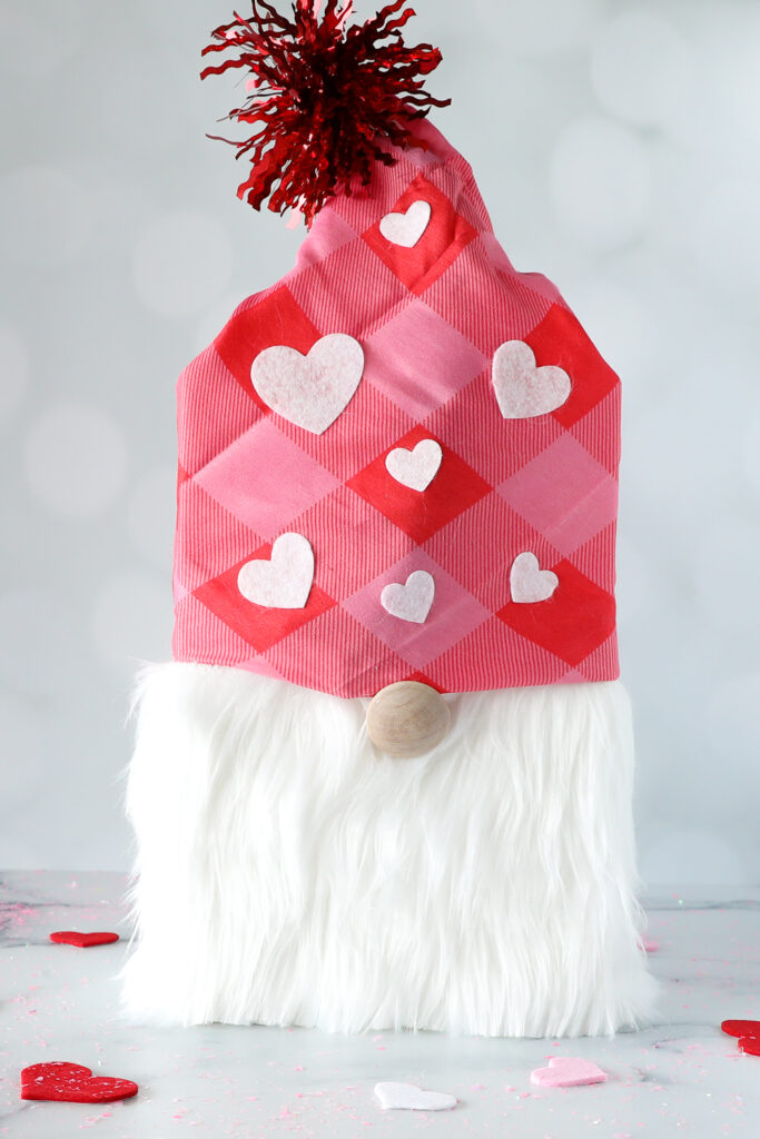 A Gnome Box surrounded by heart-themed accents on a light background.