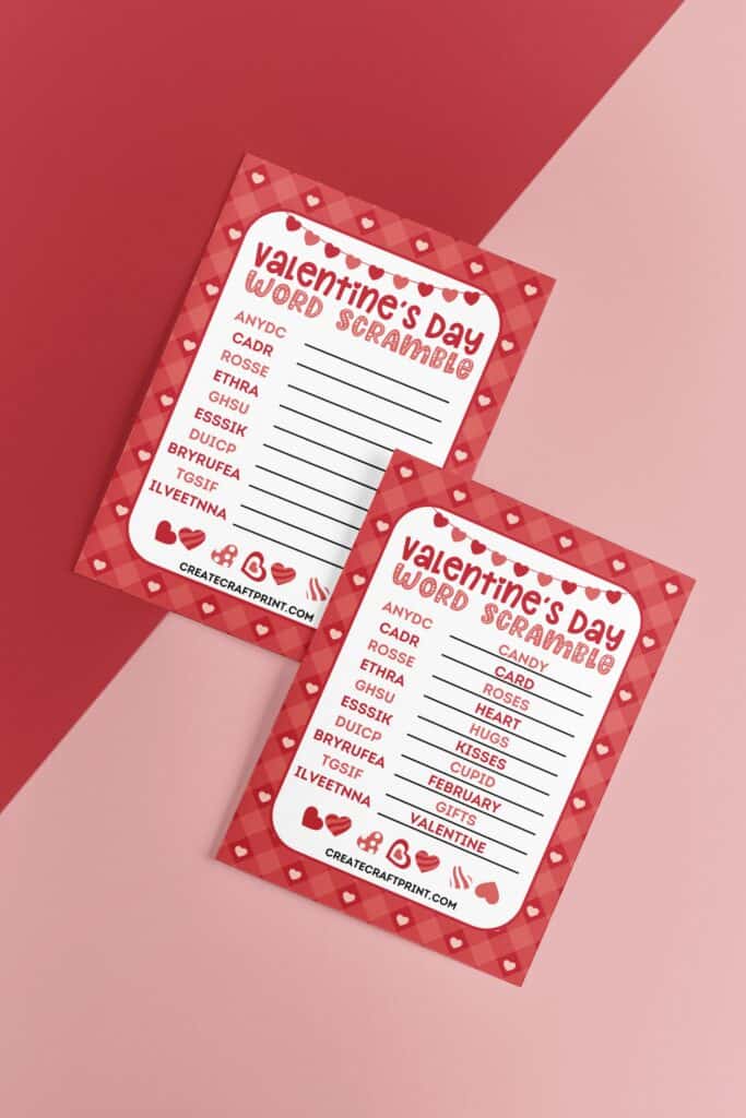 Two Valentine's Day word scramble sheets placed diagonally on a red and pink background, showing both the blank and completed versions.