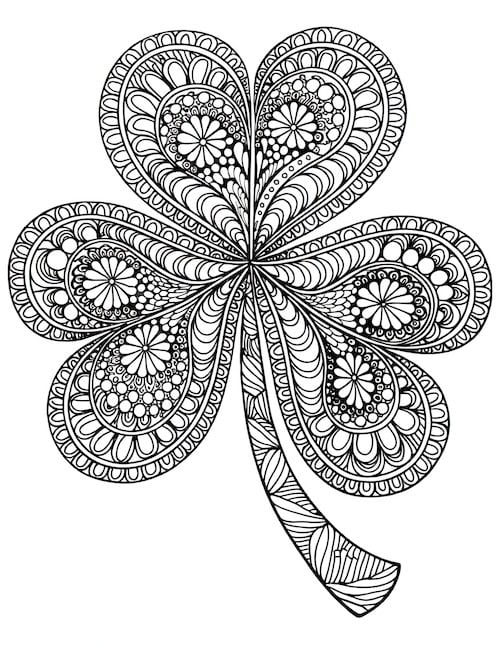 intricate mandala shamrock design with detailed floral and geometric patterns.