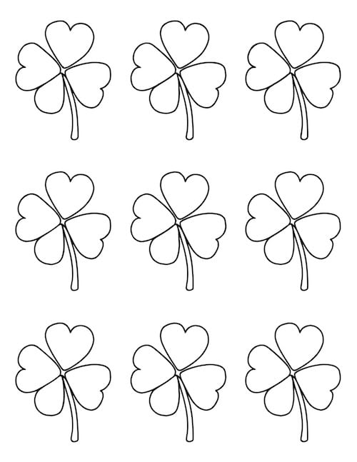  Nine shamrocks evenly spaced on a white background.