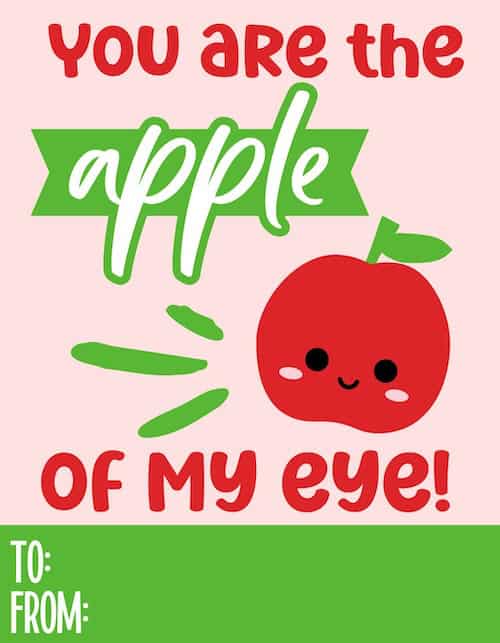 Red apple with a smiling face and text reading 'You are the apple of my eye!' with green accents on a pink background.